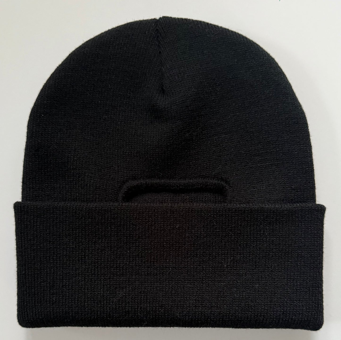 Tight knitted watch cap with hair opening